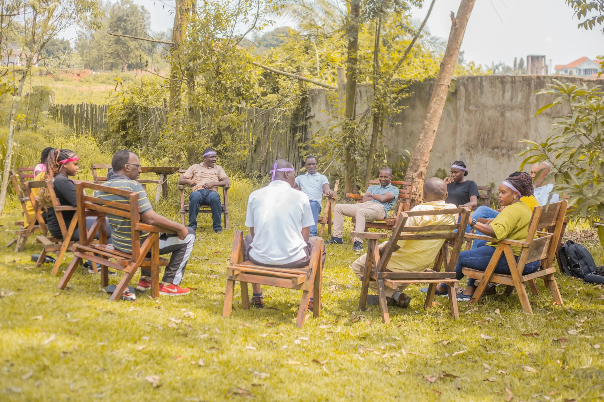 a corporate team meeting somewhere in the outdoors
